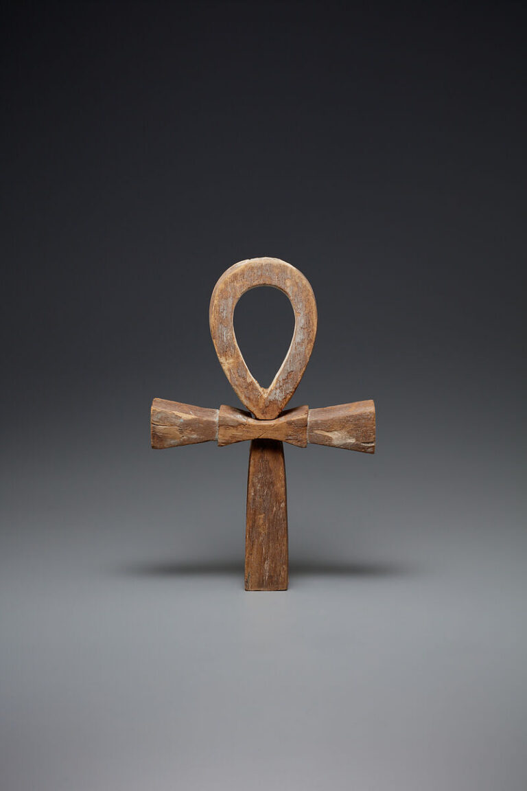 Ancient Egyptian wooden model ankh with a loop above its crossbar