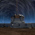 Long-exposure star trails circling Polaris above Gemini North Observatory